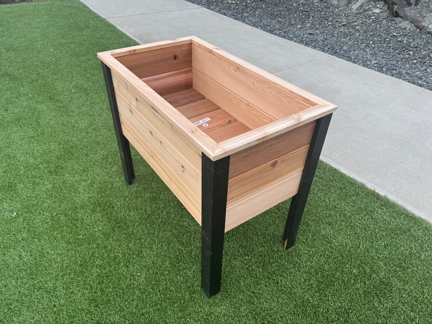2048Blk - 48"L x 20"W x 30"H Red Cedar Planter with Black Cedar Legs