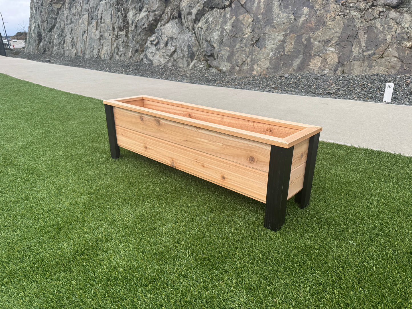 1248Blk - 48"L x 12"W x 15"H Red Cedar Flower Planter with Black Cedar Legs