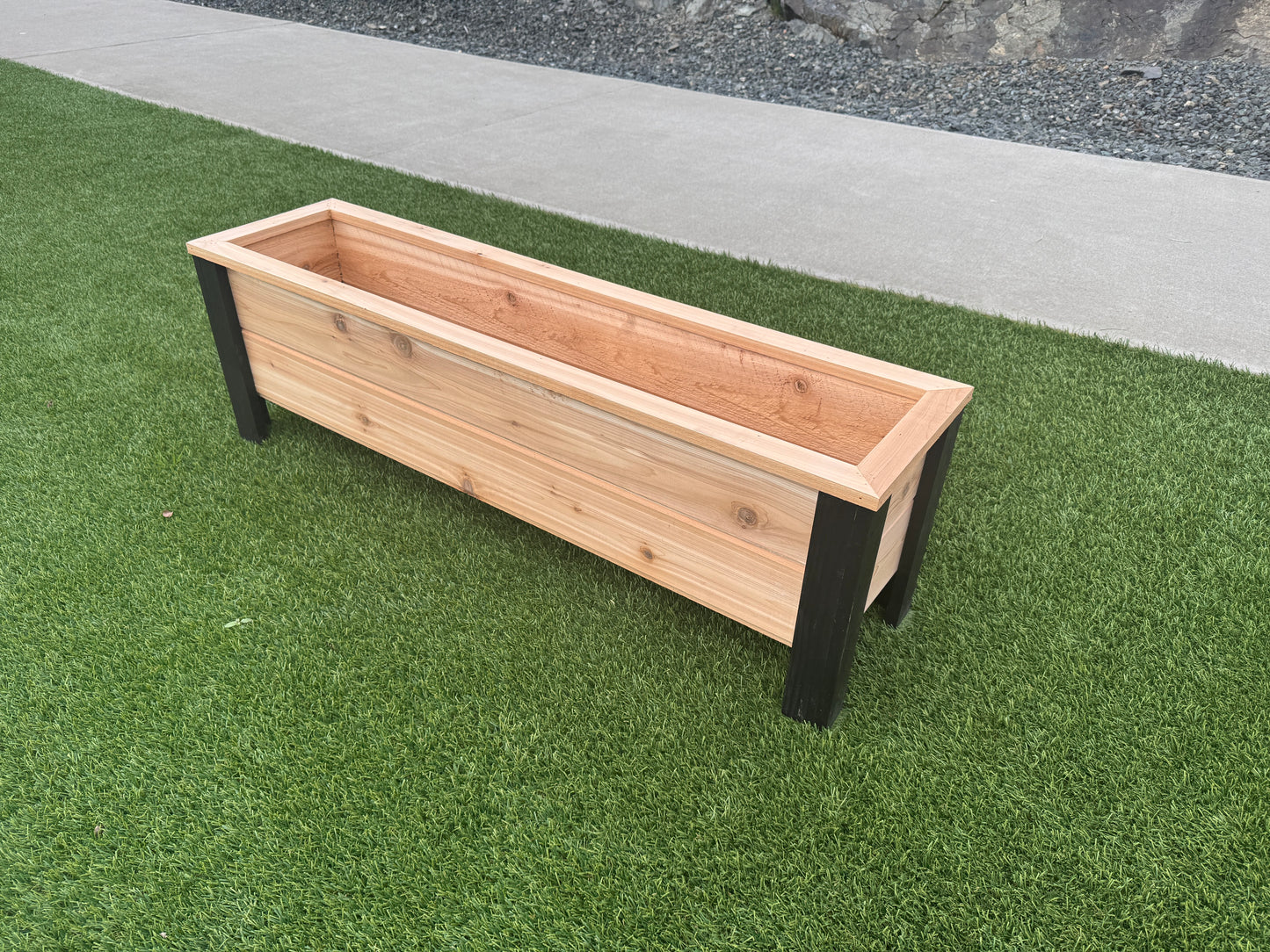 1248Blk - 48"L x 12"W x 15"H Red Cedar Flower Planter with Black Cedar Legs