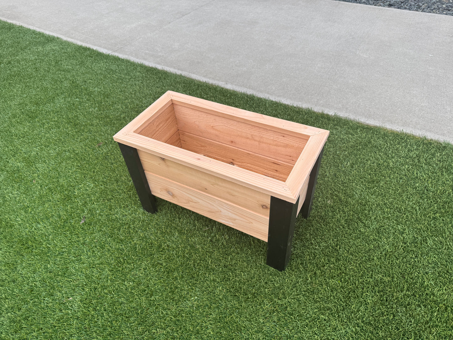 1224Blk - 24"L x 12"W x 15"H Red Cedar Flower Planter with Black Cedar Legs