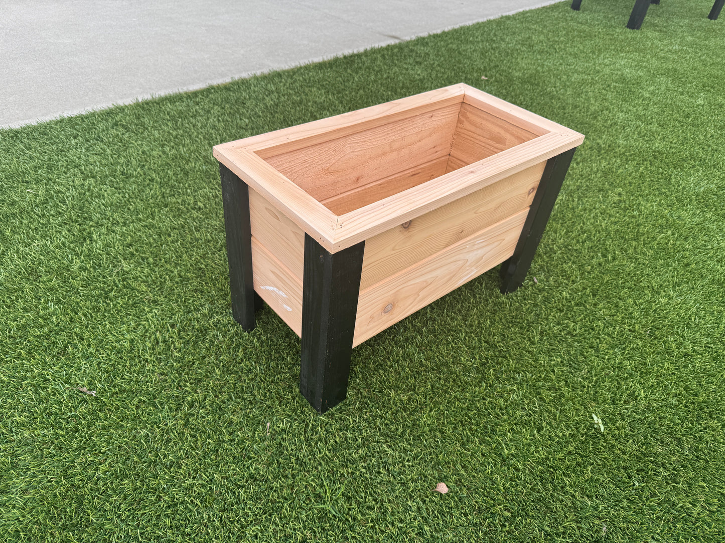 1224Blk - 24"L x 12"W x 15"H Red Cedar Flower Planter with Black Cedar Legs